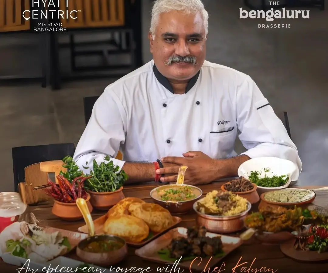 Here I am with a full spread of my Naati dishes during a pop-up. This is what my culinary takeovers are all about: an epicurean voyage into authentic, meat-forward family recipes, from Mutton Palav to various roasts and curries.