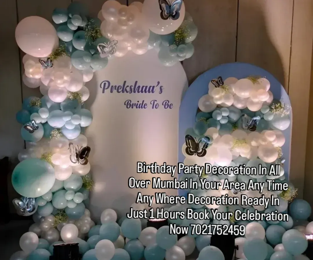 For a modern bridal shower, I designed this elegant backdrop using a cool palette of pastel blue, white, and silver balloons. The personalized "Bride to Be" sign and delicate butterfly details add a unique touch.