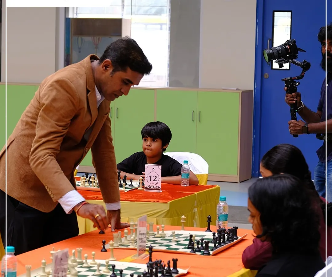 A rare opportunity for our young players to challenge a master. This is Grandmaster M.S. Thejkumar in a simultaneous chess match, offering an unforgettable experience during our Chess Carnival.