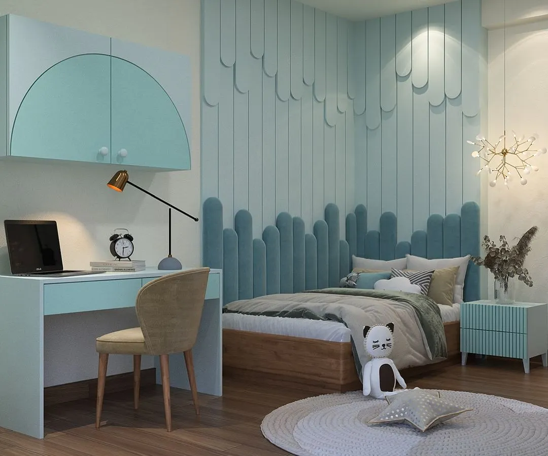 This modern kids' room in Ivy County, Noida, showcases a serene and sophisticated design. We used a soft teal palette, custom wall paneling with a wave-like texture, and a sleek study area to create a space that is both calming and conducive to creativity. The design is intended to grow with the child.