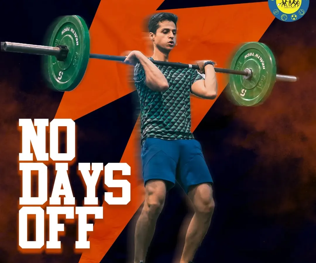 We believe in consistency. This image captures our "No Days Off" mentality, where every session is a chance to get stronger. Here, an athlete performs a clean, a core lift in our cross-functional strength program.