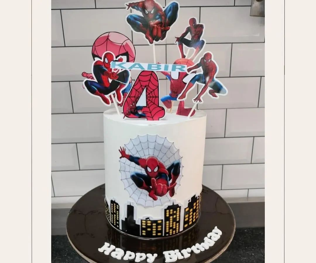 For the little superhero in your life, this Spiderman-themed birthday cake is a guaranteed hit. Featuring a city skyline base and multiple Spidey toppers, I can personalize it with any name and age to make your child's celebration extra special.