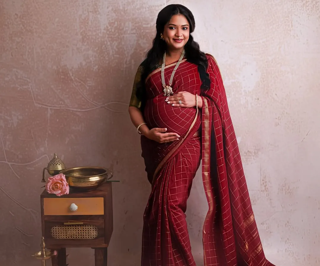 There is a special kind of magic in a traditional maternity shoot. This gorgeous mother-to-be in a rich red pattu saree is the perfect example of grace and cultural elegance. I love capturing the richness of our heritage in these precious moments.