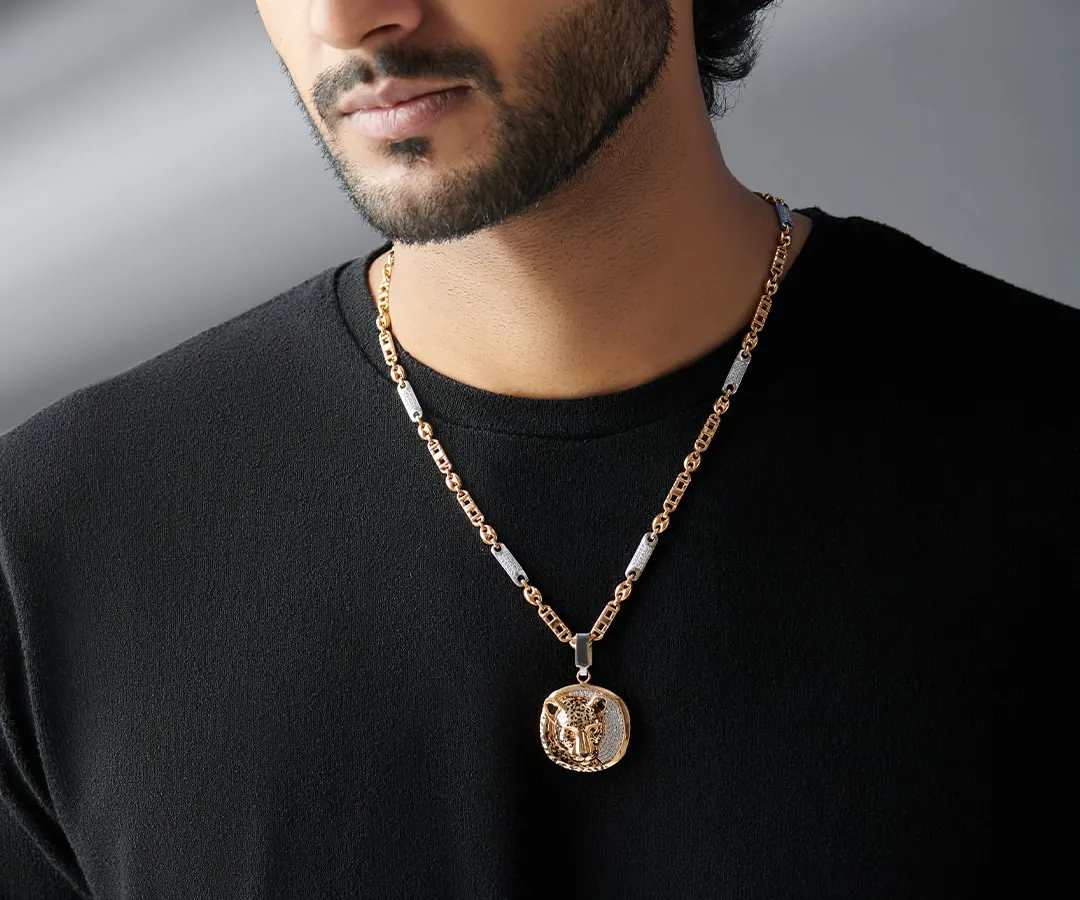 The panther head pendant is one of my signature pieces, representing strength and instinct. Paired with a two-tone gold chain, it’s a modern heirloom designed for the man who leads with confidence.
