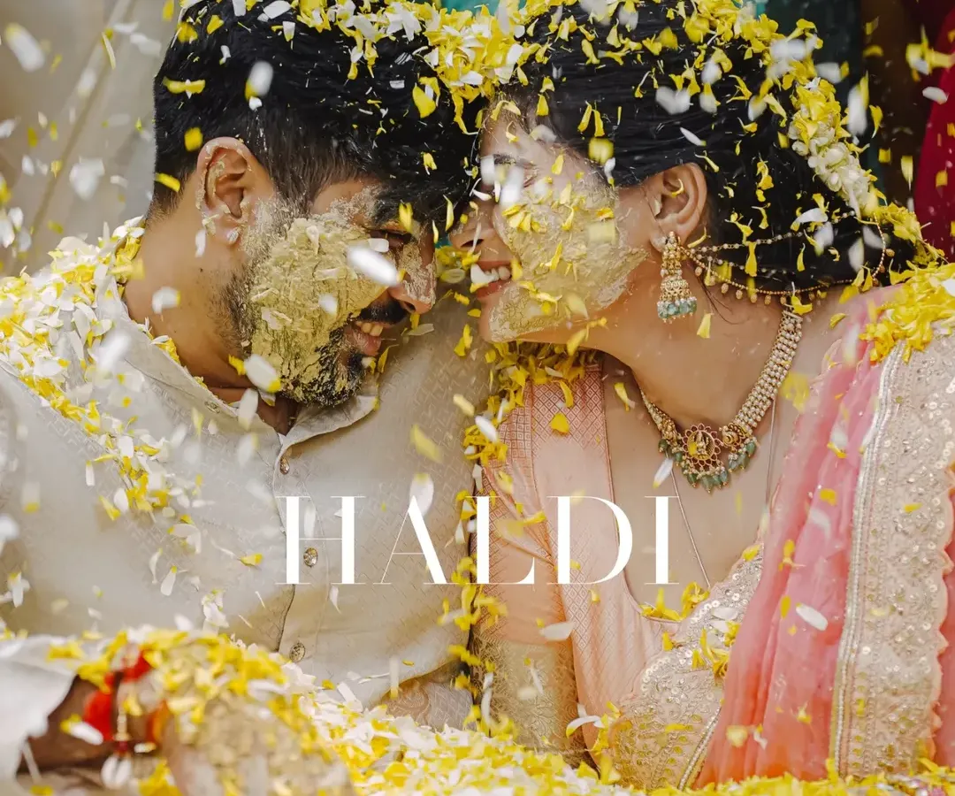 In a shower of marigold petals and pure joy, this is the heart of a Haldi ceremony. I focus on these unscripted moments of laughter and connection, where the turmeric paste becomes a paint of happiness.