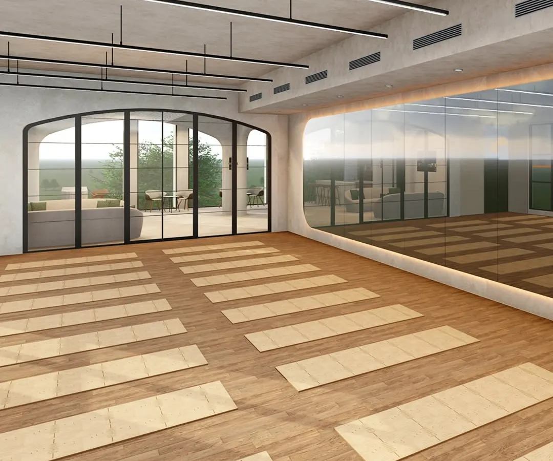 I designed the Yoga Hall at Ignite + Aliign Studio in Bengaluru as a tranquil retreat for mindfulness and movement. The warm wooden flooring, minimalist lighting, and arched glass doors connect the interior to the outdoors, fostering a sense of calm and focus.