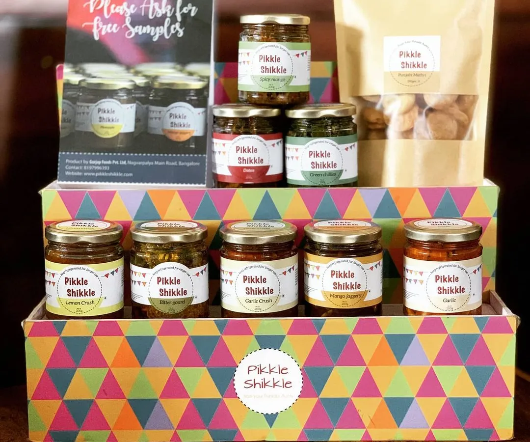 Here is a look at our family of products. We have a full range of homemade Punjabi pickles, jams, and traditional savouries like Mathri, all ready to be enjoyed.