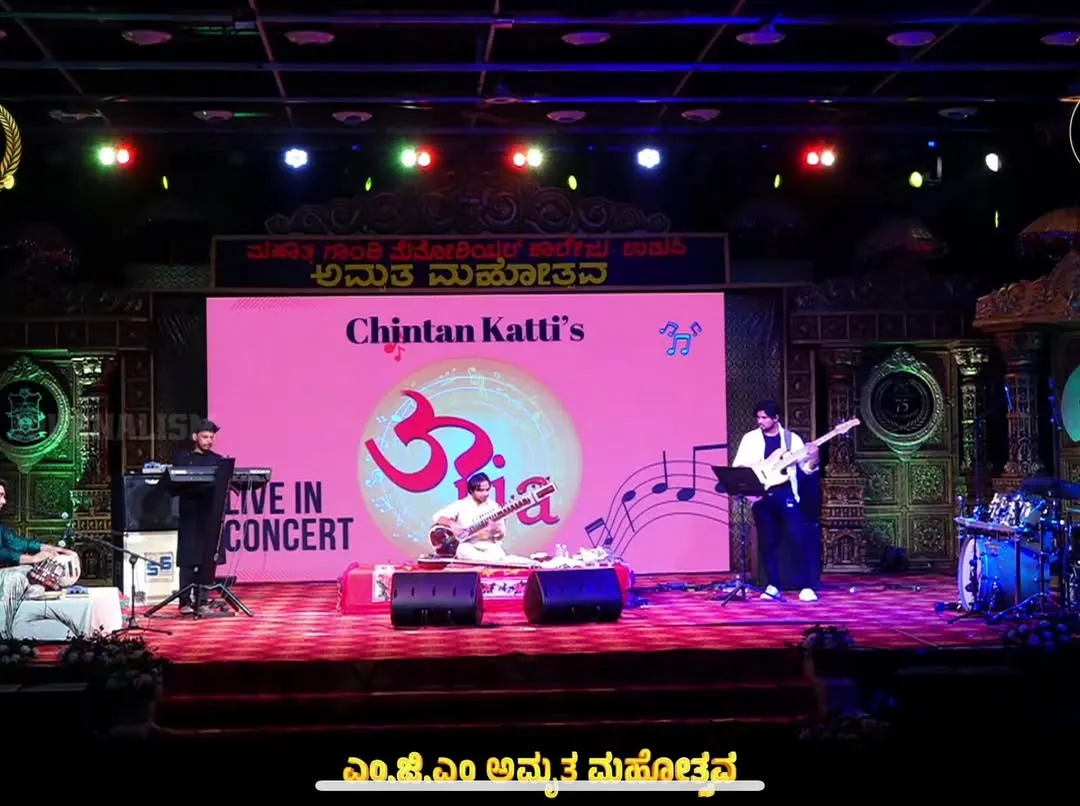 Here is my fusion band 'Urja' live in concert in Udupi. This image captures the scale and energy of our performances, where we blend traditional sitar with drums, bass, and keyboards for a powerful sound.