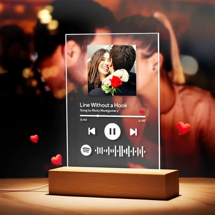 Capture your special song forever with a personalized music plaque. I engrave your photo and the song details onto a clear acrylic plaque with a wooden stand, creating a beautiful desk ornament that links directly to your music.