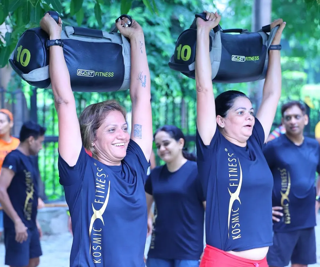 Strength comes in many forms, and here, it comes with a smile. My functional bootcamp sessions use equipment like sandbags to build real-world power. It's about becoming strong for life, not just for the gym.