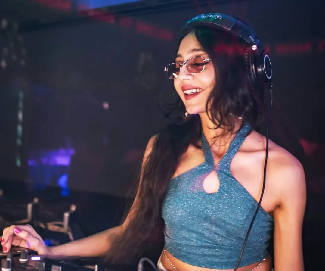 In my element, finding the perfect beat for the Saturday night crowd. A good club set is all about reading the room and keeping the energy high with a mix of new hits and throwback Bollywood anthems.