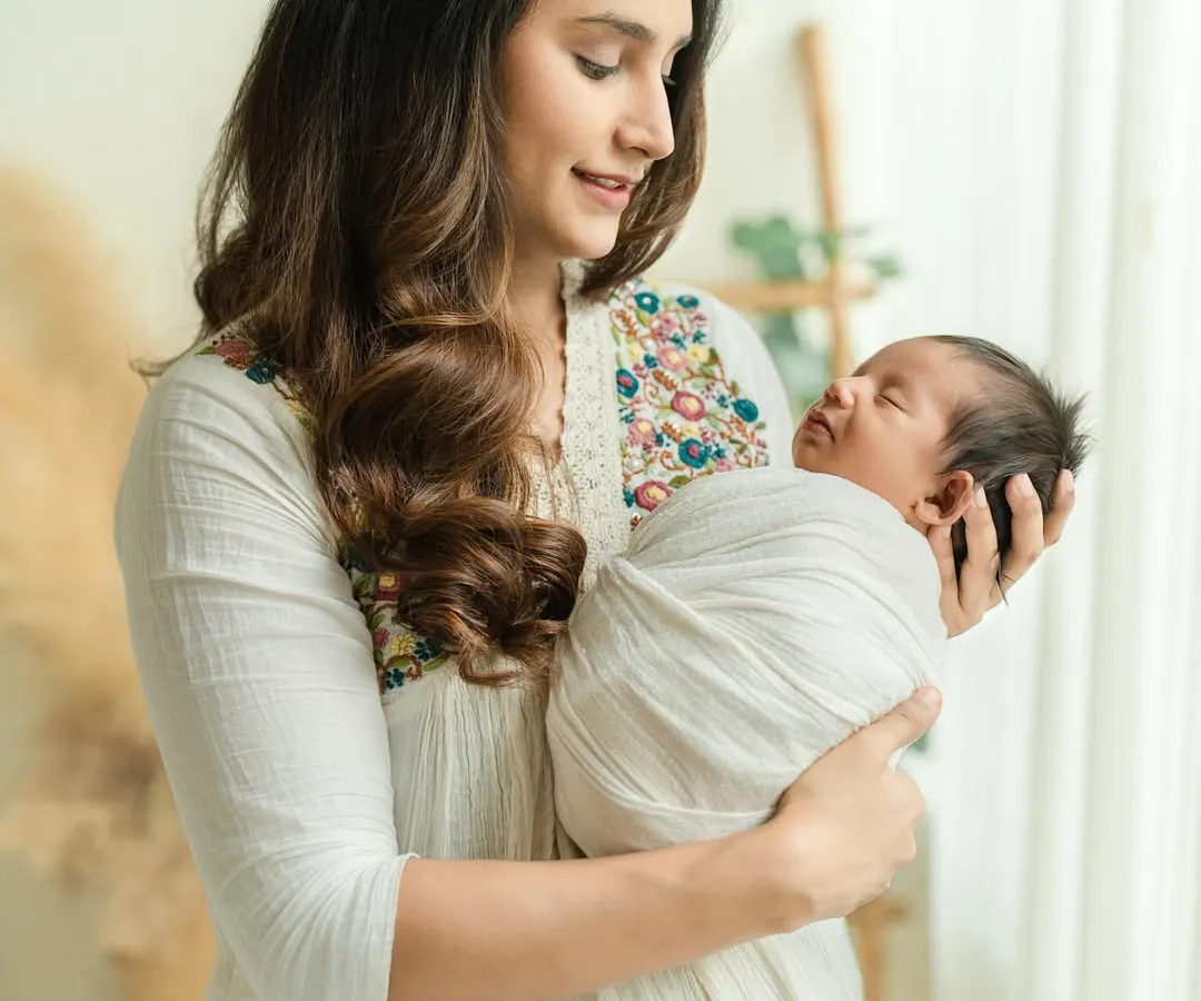 There is nothing more powerful than a mother's love. In this natural light portrait, I aimed to capture that quiet, unbreakable bond in the comfort of my studio.