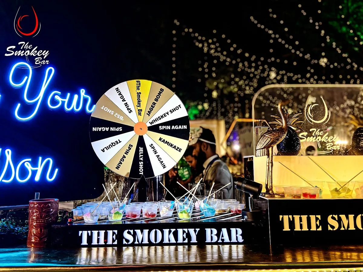 I believe a bar should be interactive and fun. Here's my custom shot wheel in action, a fantastic icebreaker that gets guests mingling and trying a variety of shots like Jager Bombs, Kamikaze, and Tequila. It’s a guaranteed way to get the party started.