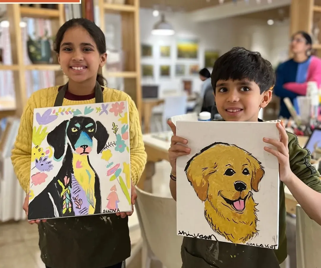 I love seeing the pride on our Little Art Explorers' faces. These two created their own colorful dog portraits during a drop-in painting session, each one with its own unique personality.