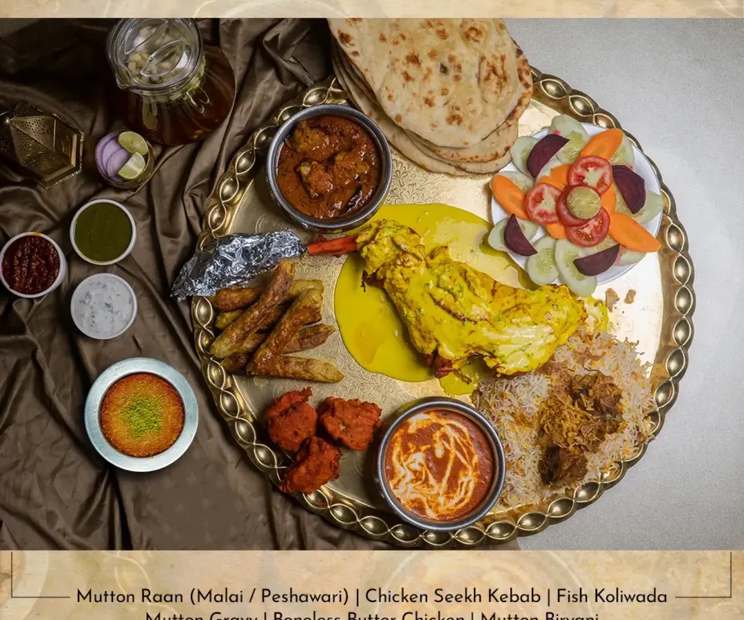 Behold the Akbari Thaal, a royal feast designed for sharing with 4-6 people. It features a grand selection including Mutton Raan, Chicken Seekh Kebab, Boneless Butter Chicken, and Mutton Biryani, making you feel like true royalty.