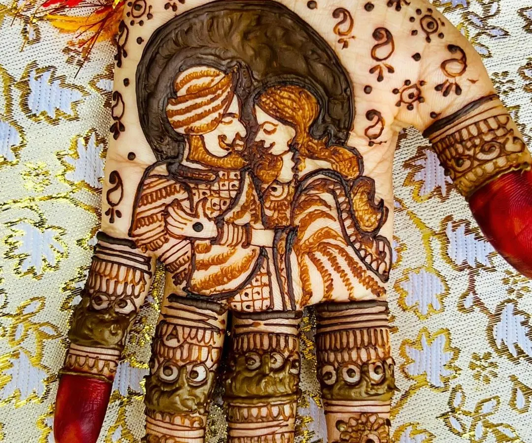 A close up of a custom couple portrait, capturing a special moment for the bride. I love working with you to bring these personal stories to life in your engagement or wedding henna.