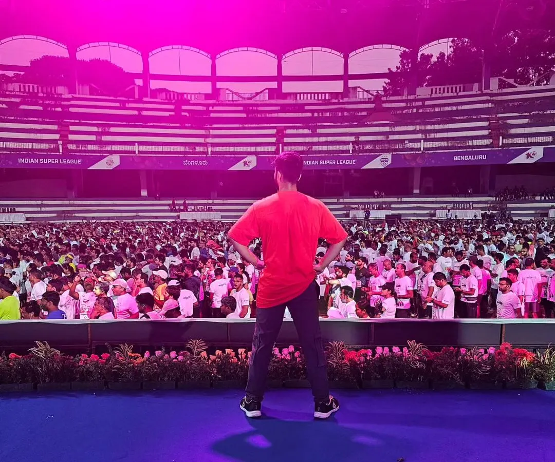 From the office floor to the stadium stage, we bring the same level of energy. Here I am, looking out at a massive crowd, ready to lead a high-energy Zumba warm-up. We handle events of all sizes with confidence and passion.