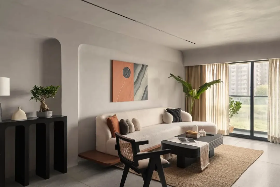 Natural light floods this living room, highlighting the soft texture of the boucle sofa and the clean lines of the custom furniture. I design spaces that feel both sophisticated and comfortable, perfect for everyday living.