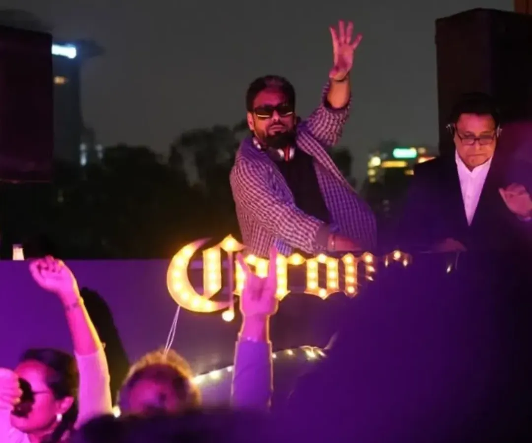 At the helm of Luru Christmas, my annual formal social. Here, I'm spinning a mix of retro, disco, and rock 'n' roll for a well-dressed crowd, proving that a great party is about crafting the perfect vibe for the theme.