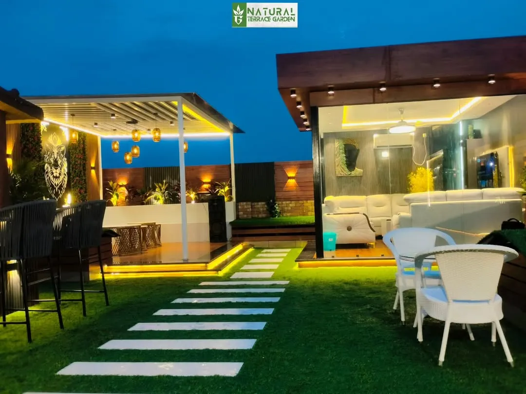 This expansive rooftop in Shahdara was transformed into a multi-zone paradise. The design includes a glass house, a separate pergola lounge, and a lush artificial lawn, showcasing our ability to execute large-scale, comprehensive landscape projects.