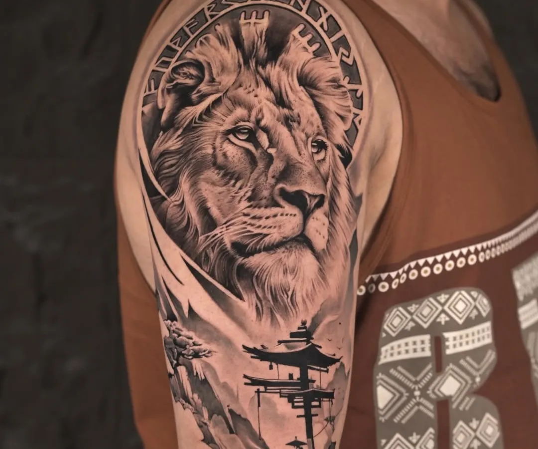 We specialize in black and grey realism that feels alive. This lion and landscape half-sleeve combines the raw power of nature with serene symbolism, using detailed shading to create depth and a truly majestic presence on the arm.