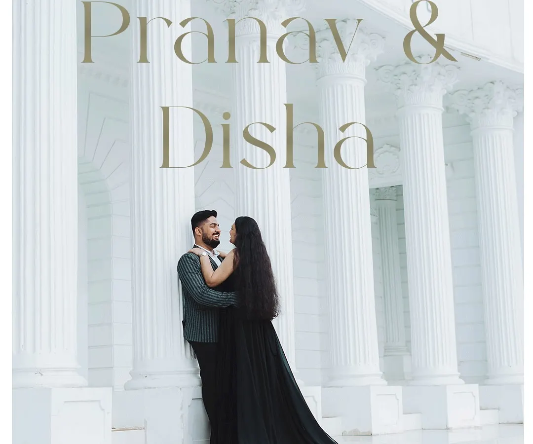 This is from a styled pre-wedding shoot, creating a dramatic and elegant portrait. The grand architecture and the bride's flowing gown come together to produce a truly showstopping image that feels like a movie poster for your own love story.