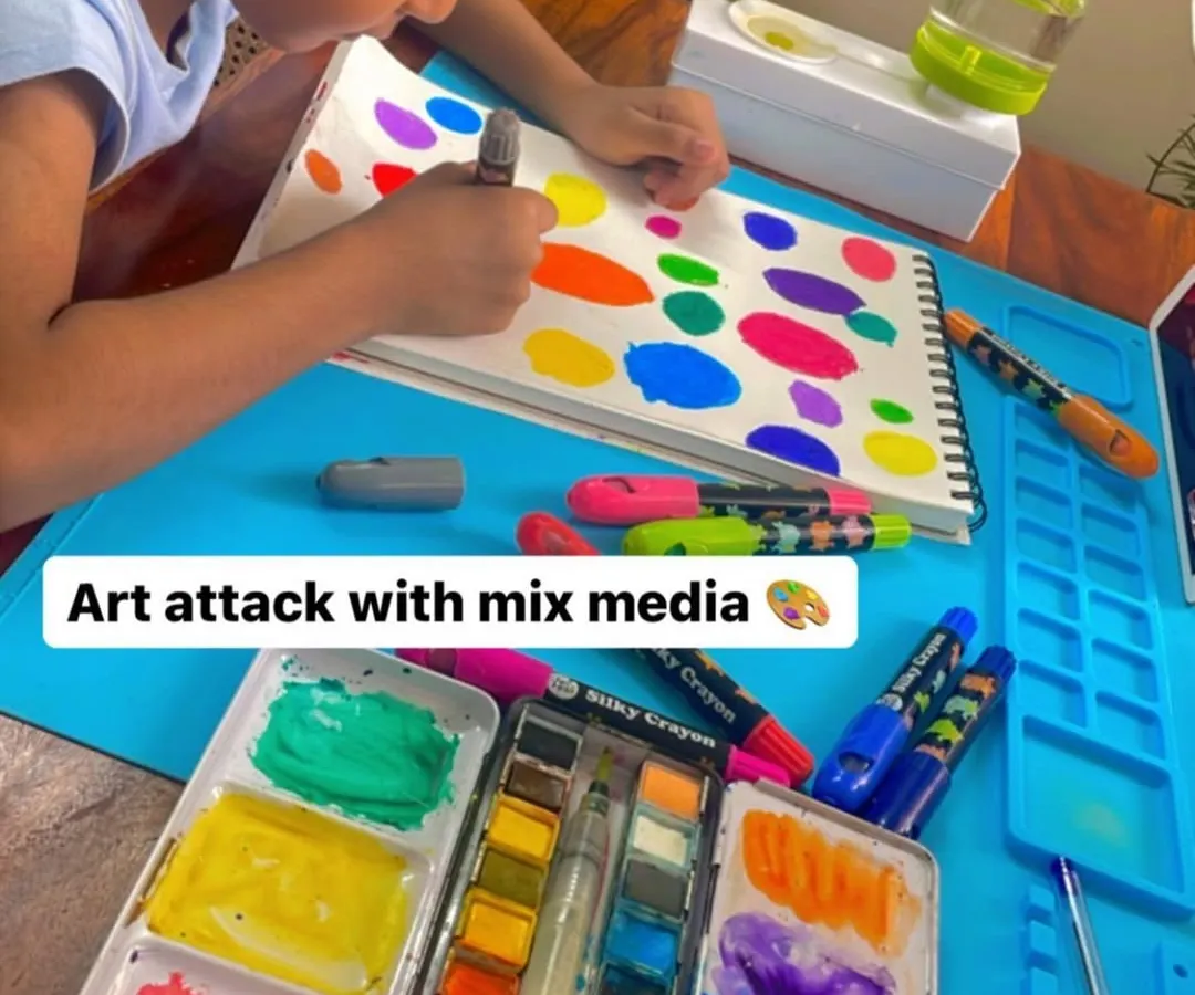 See the magic of process art in action. With my kits, there are no rules, just pure exploration. This little artist is using a mix of watercolors and crayons to create his own world of dots, building confidence and telling his own story with every color he chooses.
