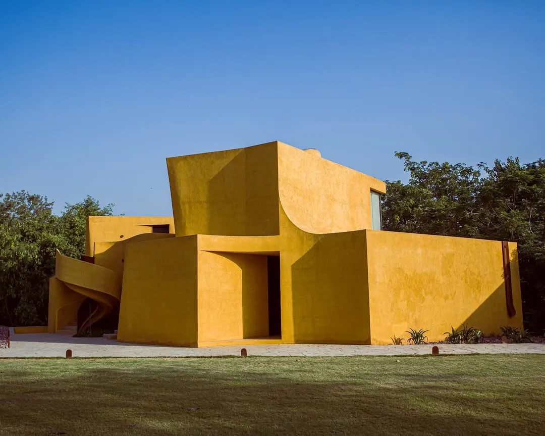 I designed Anvaya's architecture to be in conversation with nature. The sun-soaked ochre walls and organic curves create a sense of being both grounded and free, a structure rooted in design and wrapped in the wild.