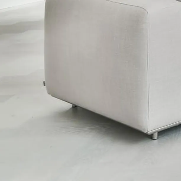 Imagine this clean, modern look in your own home. This light grey wooden flooring adds a touch of elegance and makes any space feel brighter and more spacious. It’s not just beautiful, it’s also durable and easy to maintain.
