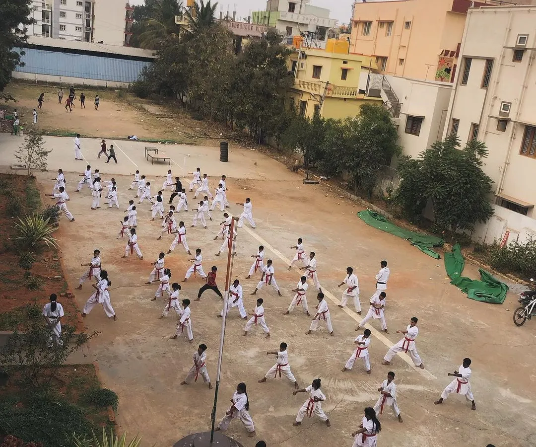 Our Kyokushin family is over 250 strong. Here you can see just a part of our main dojo during an outdoor training session, everyone moving with a single purpose. This is the energy you will feel when you train with us.