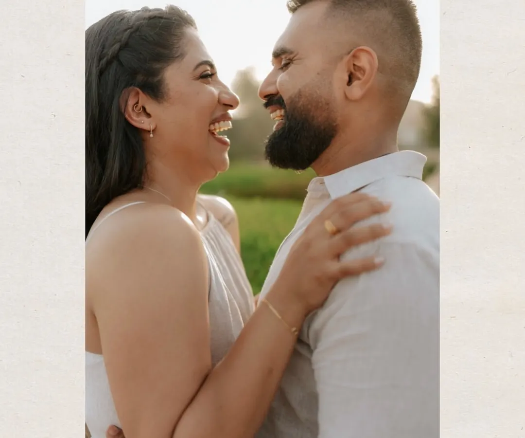 This is what it's all about for me: capturing pure, unscripted laughter. My focus is on candid couple portraits that show your genuine connection.