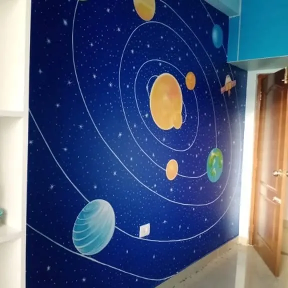 A custom hand-painted mural of the solar system, perfect for a child's bedroom or playroom, creating an educational and imaginative deep space theme.