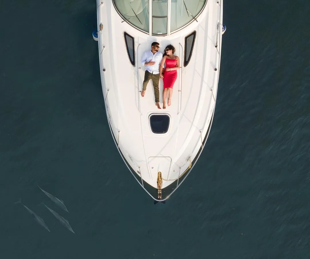 Using my drone, I captured this stunning aerial shot of a couple relaxing on a private yacht in Goa. This perspective adds a touch of luxury and scale, turning a beautiful moment into an epic memory.