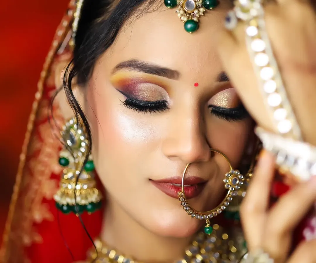 Mastering the classic Indian bridal look is a cornerstone of our curriculum. Here, our students perfected a radiant, HD-ready finish with a dramatic smokey eye and flawless skin, a look that is timeless and in high demand.