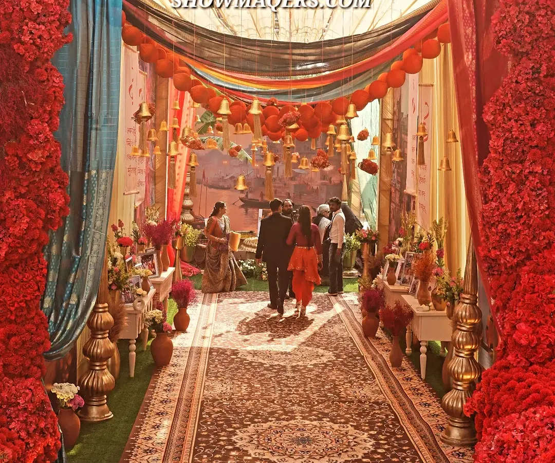 We brought the soul of Banaras to life with this vibrant and detailed entrance. The design features a rich tapestry of colors, traditional motifs, hanging temple bells, and layered fabrics, creating an authentic and culturally rich experience for a themed mehendi party.