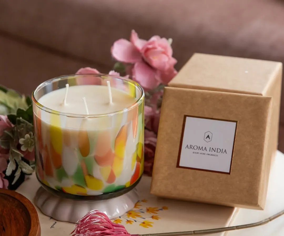 This is one of my favorite artistic creations. The three-wick soy candle, housed in a vibrant, hand-finished glass jar, is a statement piece that brings both beautiful fragrance and a pop of color to your home. It comes ready to gift in a simple, eco-friendly kraft box.