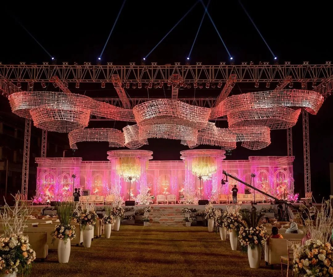 This is what I mean by building experiences. We transformed a 50,000 sq ft lawn into a palatial wonderland with an 80-foot custom stage and breathtaking crystal installations, all executed in just one and a half days for a grand reception in Mumbai.