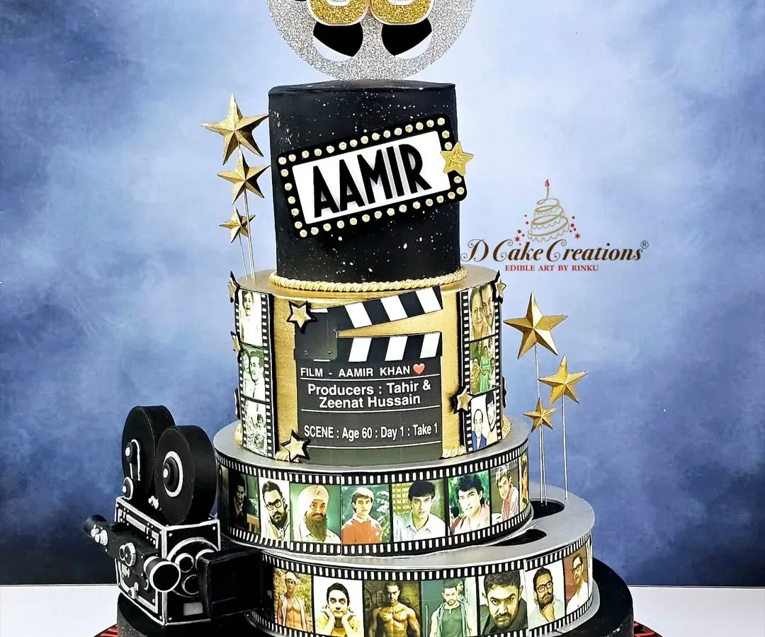 It was an honor to design this special cake for Bollywood's "Mr. Perfectionist," Aamir Khan. This multi-tiered creation celebrates his cinematic journey with edible film reels, a movie clapperboard, and a glittering "60" topper for his milestone birthday.