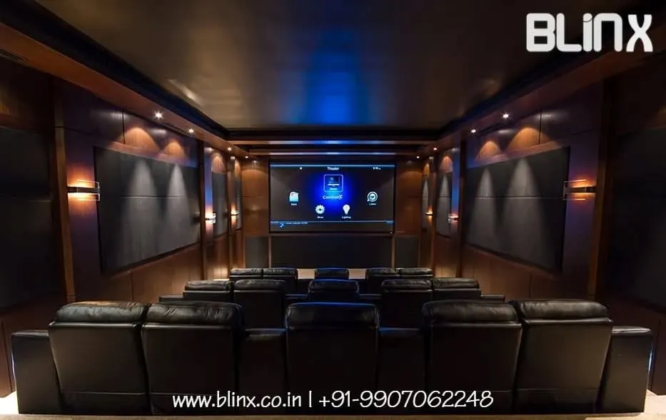 We design and install dedicated home cinema rooms that deliver an unparalleled audio-visual experience. This setup features acoustically treated walls, tiered luxury seating, and a professionally calibrated projection system for true cinematic immersion.
