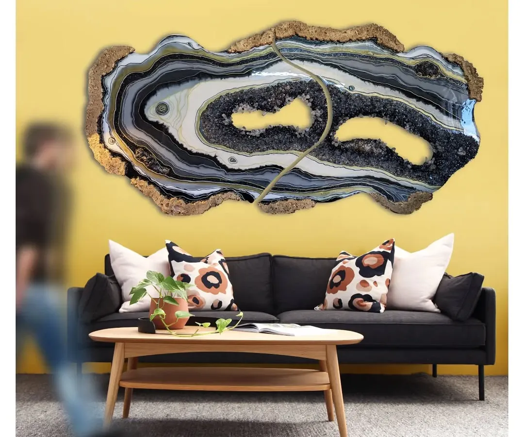 My 'Starry Night' geode artwork finding its home. I love how the black, white, and gold layers with real crystals bring a touch of cosmic energy and luxury to a living room.
