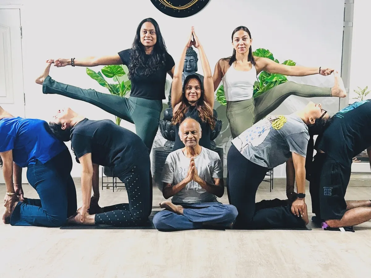 Our community is our strength. This picture captures the pure joy, laughter, and unbreakable bonds that define our studio. We come together from all walks of life to lift each other up, creating a human mandala of support and shared energy.