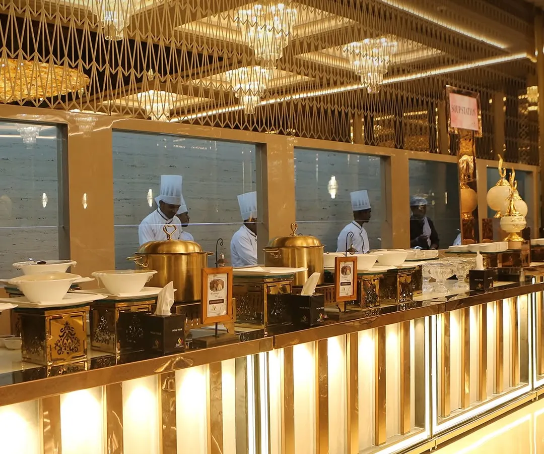 A glimpse of the grand scale I operate on at the Maxus Dome in Mira Bhayandar. This luxurious buffet setup, complete with elegant chandeliers and professional chefs, is designed to serve up to 2000 guests without compromising on quality or service.