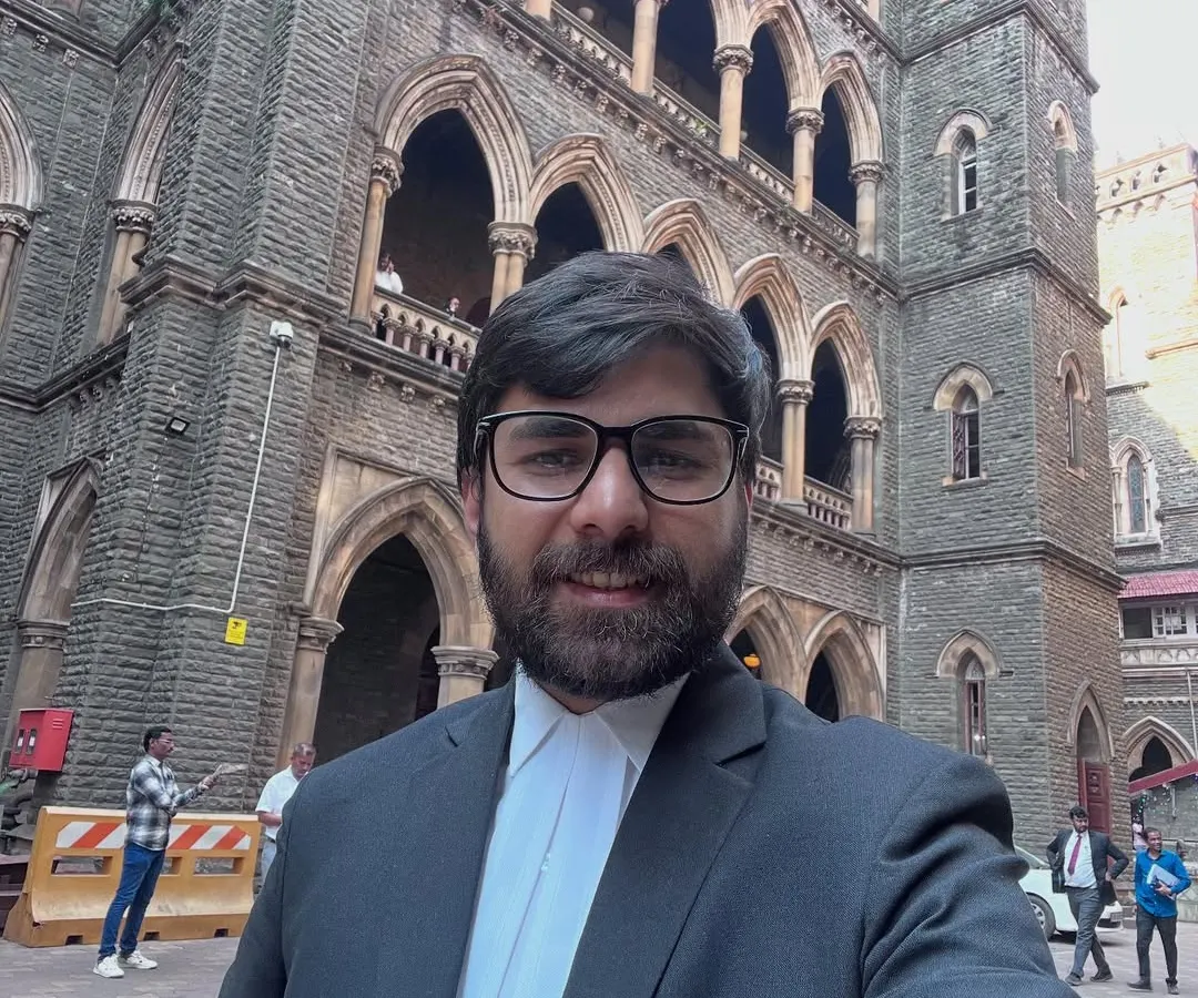 A moment outside the historic Bombay High Court. Being a criminal lawyer means I am constantly moving between different courts, always ready to represent my clients wherever justice is sought.