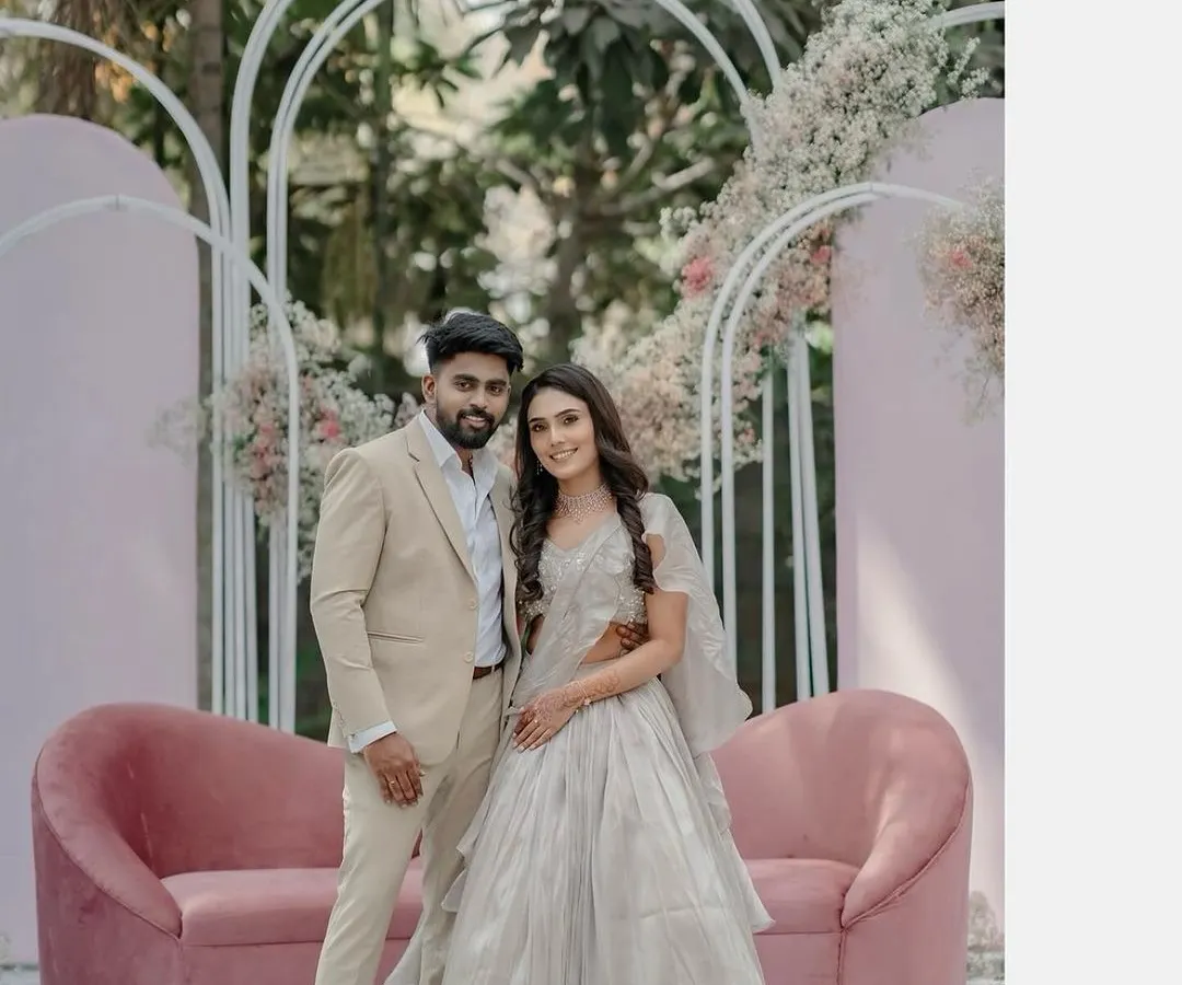 For this modern garden engagement, I created a chic and romantic backdrop. The setup features soft pastel florals, contemporary white arches, and a plush pink sofa, making it the perfect photo-ready spot for the happy couple.