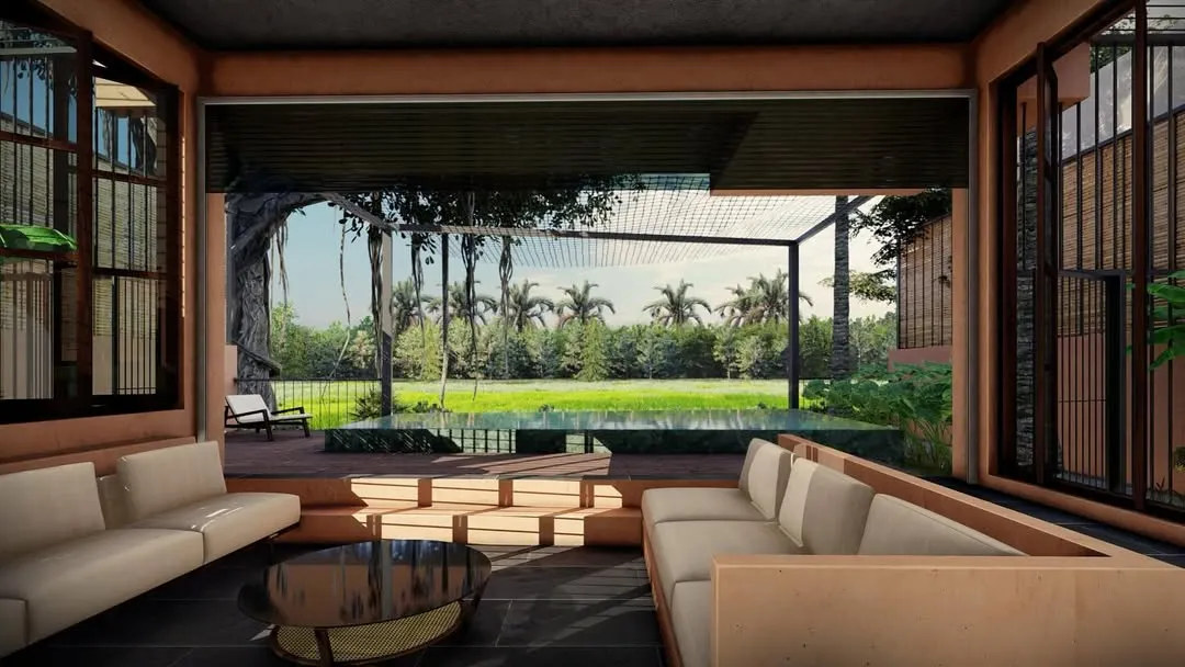 Our living spaces are designed to be open and fluid, connecting you directly with the outdoors. Here, the sunken lounge of our Corgao villa concept opens completely to the pool deck and the tropical greenery beyond, creating a seamless transition for a true indoor-outdoor lifestyle.