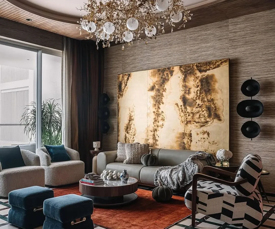 The subtle beauty of natural texture can define a room. Here, our grasscloth wallcovering envelops the space in warmth and sophistication, creating a refined backdrop that is both timeless and tactile.