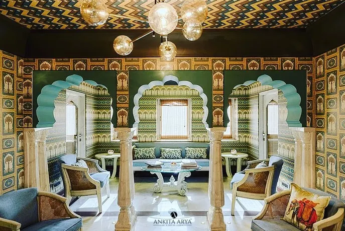 For the Surya Haveli in Jaipur, I designed a series of wallpapers that echo the city's royal heritage. This space features custom arches and patterns inspired by traditional Rajasthani architecture, creating an immersive, palatial experience.