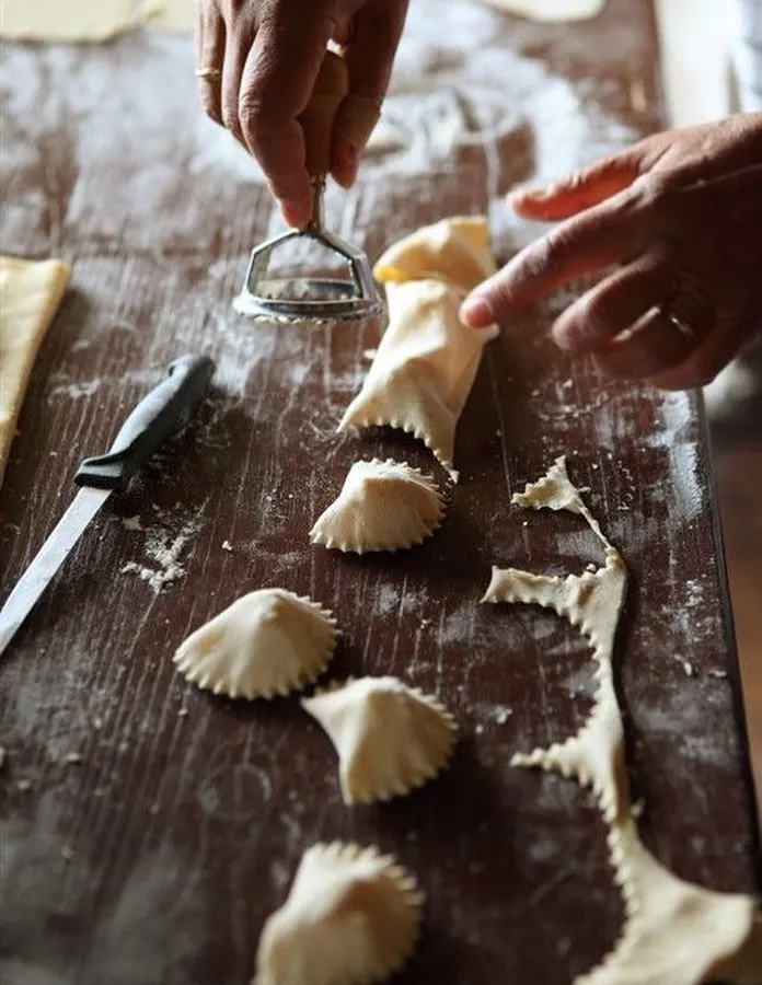 There's something so satisfying about making your own stuffed pasta. Here, I'm showing how to use a classic pasta cutter to create perfect, pillowy ravioli from fresh dough.