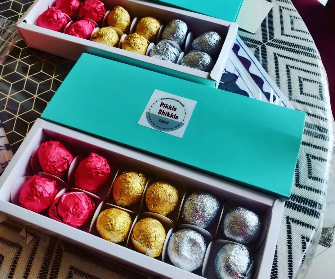 My assorted Pinni Ladoo gift boxes are perfect for any occasion. Each box contains a mix of my traditional sweets, including Aata, Jaggery, and Besan Pinni, all wrapped beautifully to share with your loved ones.