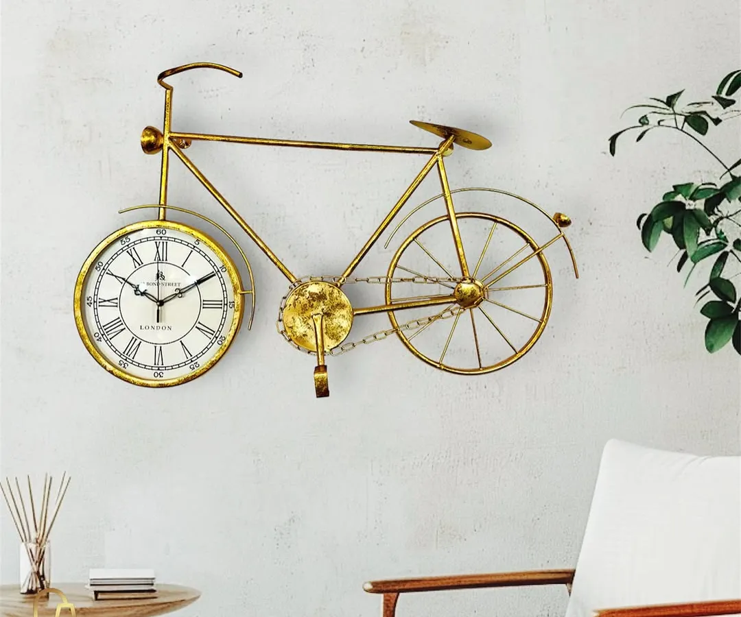 A customer favorite, this golden metal bicycle clock combines whimsical design with a classic clock face, perfect for adding a creative touch to any room.